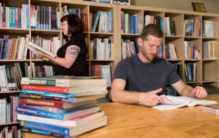 students studying at massage school east west college of the healing arts